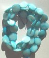 16 inch strand of 10mm Light Blue Mother of Pearl Disks